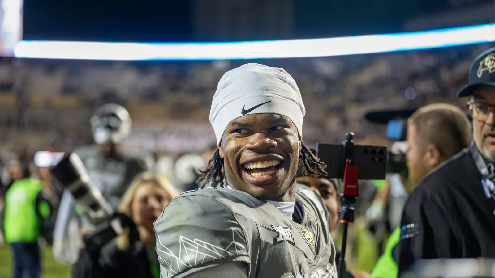 Colorado's Travis Hunter speaks after a 2024 game at Folsom Field.