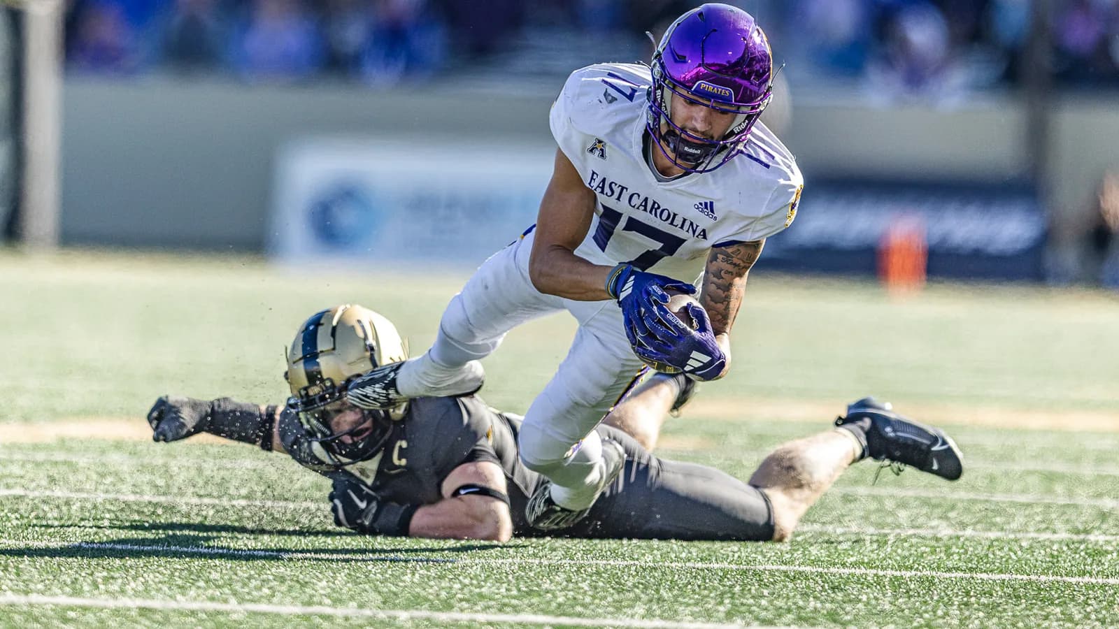 East Carolina wide receiver Anthony Smith carries the ball against Army in 2024.