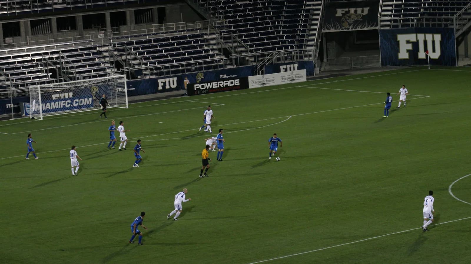 The FIU letters and Panther logo overlook the field at Pitbull Stadium.