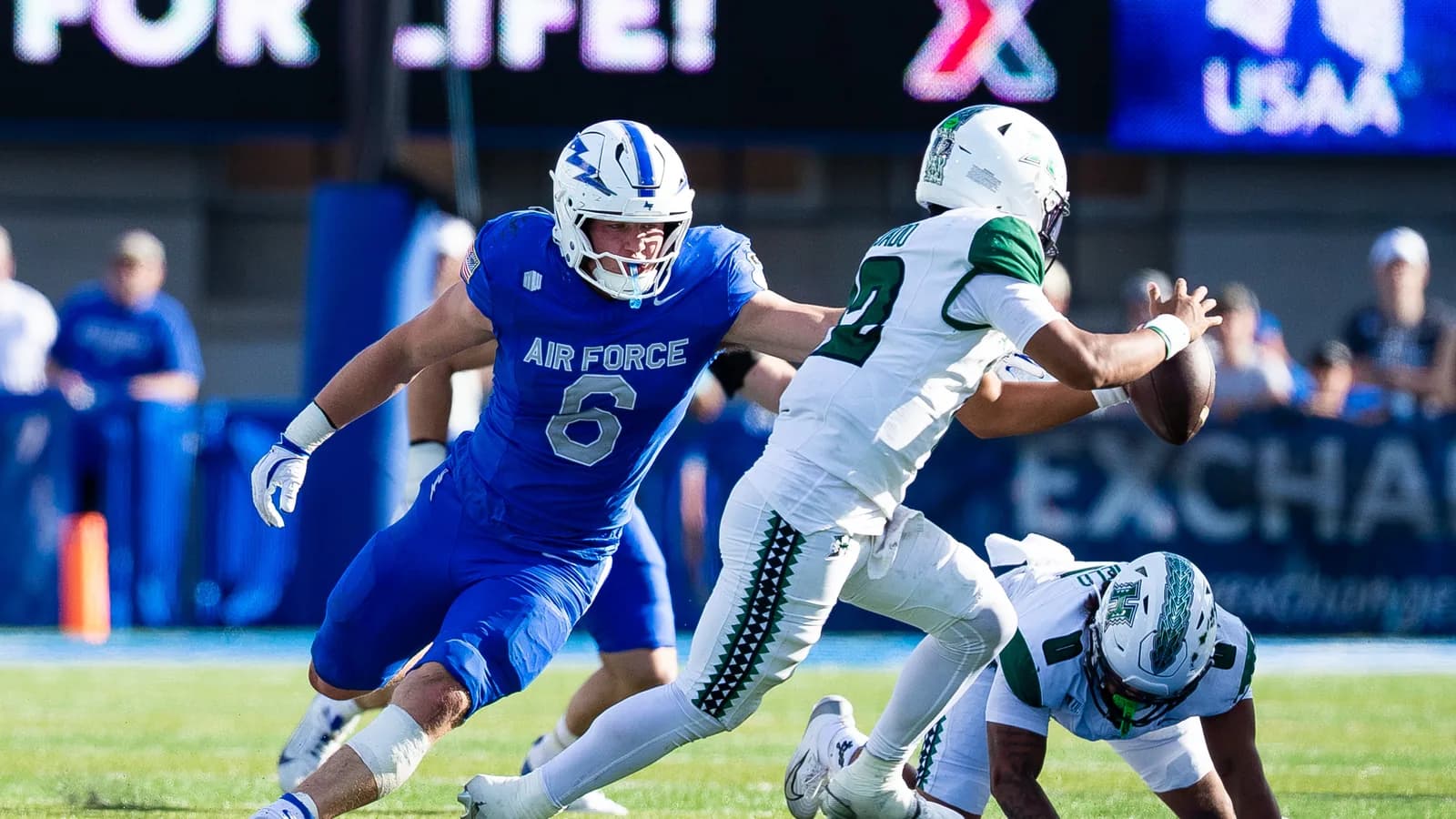 Hawaii quarterback Micah Alejado runs the ball against Air Force in 2025.