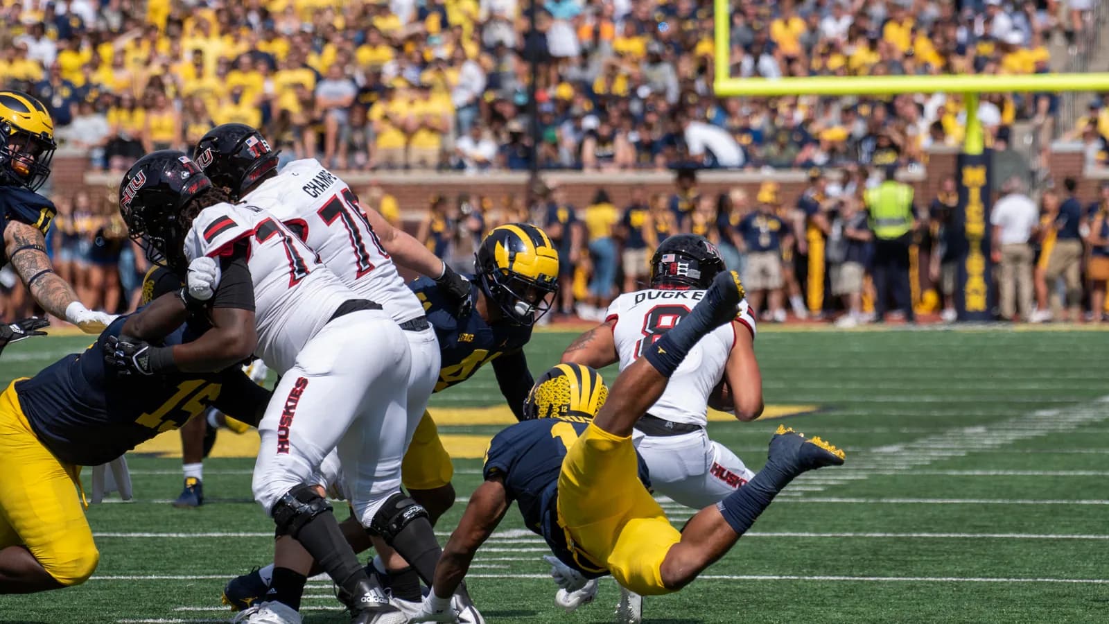 Northern Illinois kicks a field goal against Michigan in 2021.