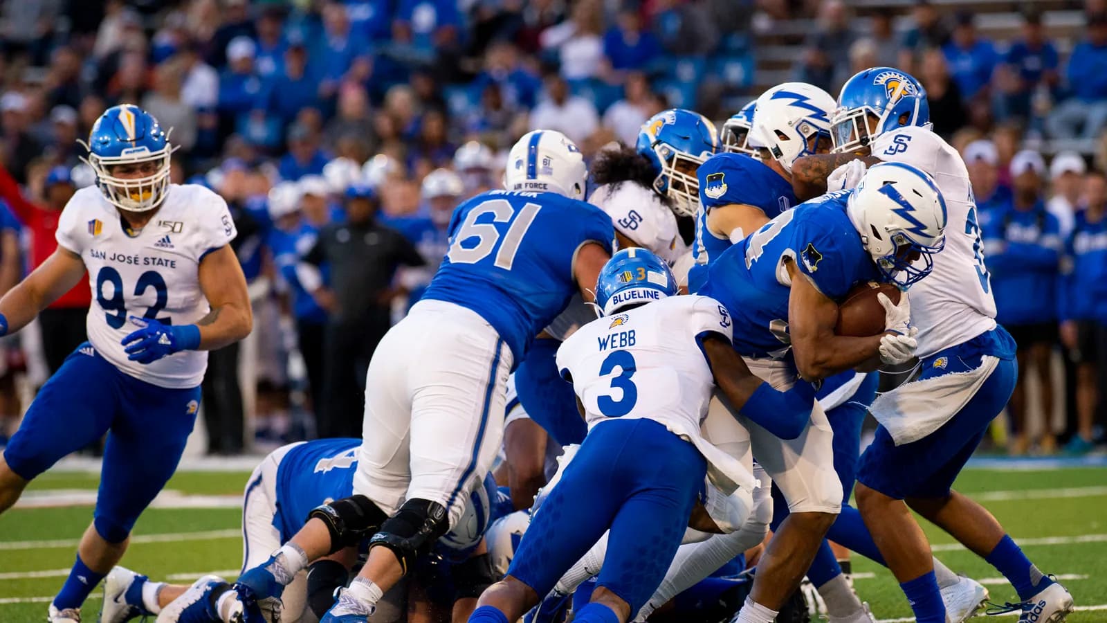 San José State and Air Force players collide during a 2019 game at the Air Force Academy.