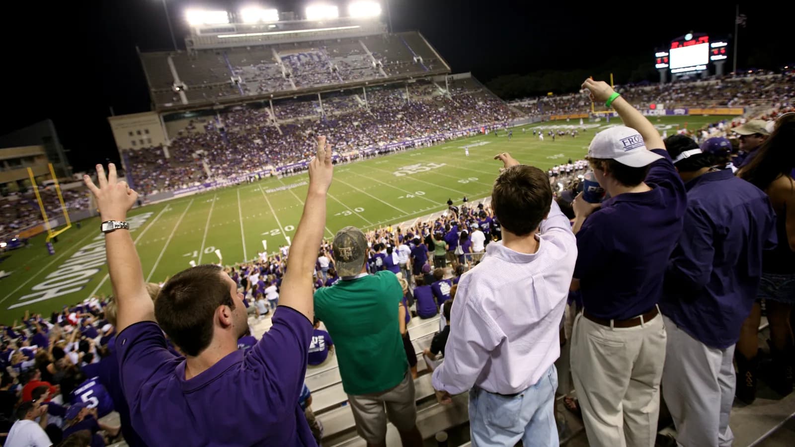 Fans celebrate at Amon G. Carter Stadium during a TCU home game.