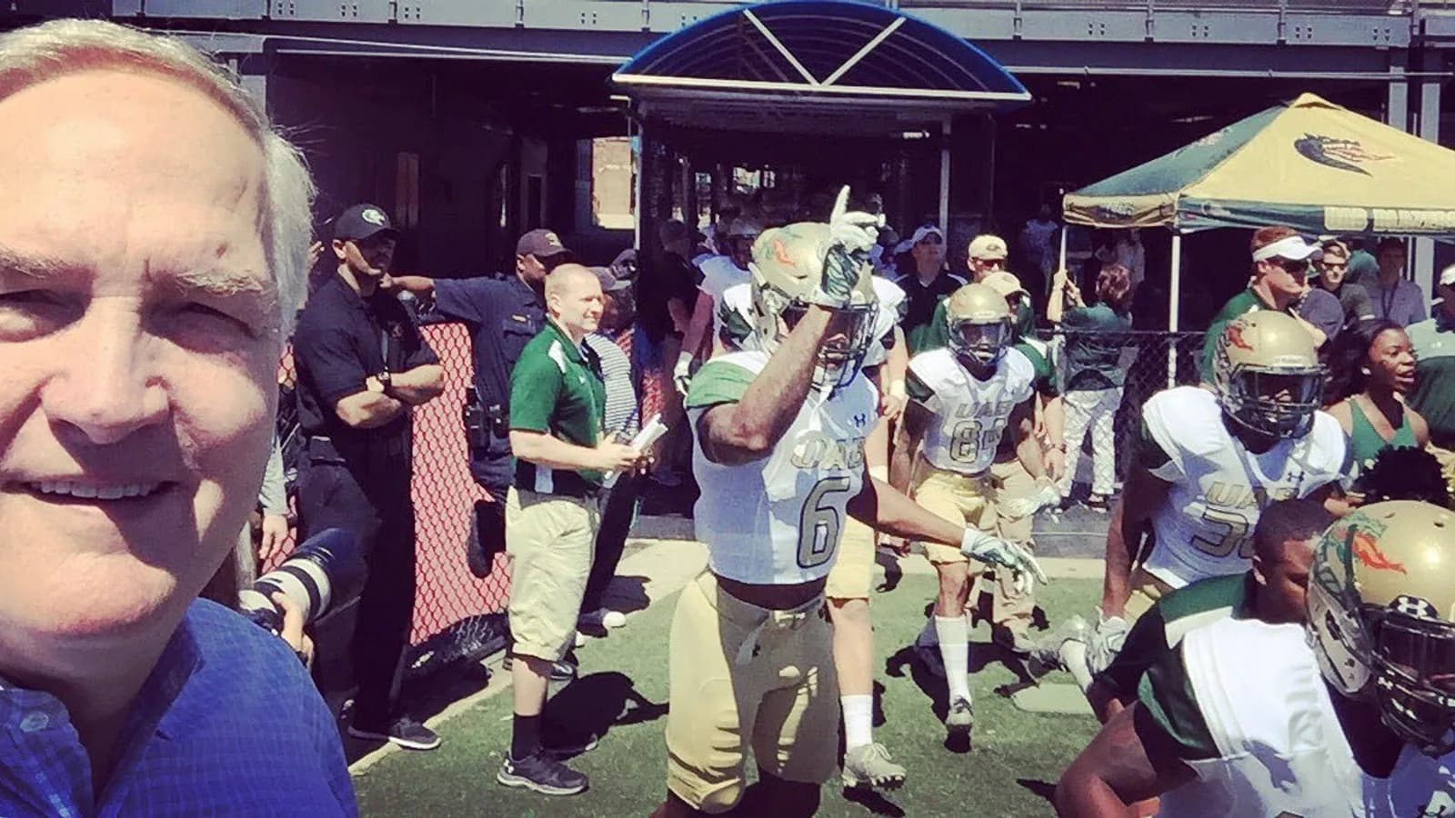 Senator Luther Strange appears in a photograph with UAB football players and attendees in 2017.
