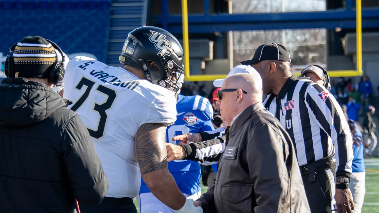 A UCF player in a Knights helmet before the 2022 Military Bowl.