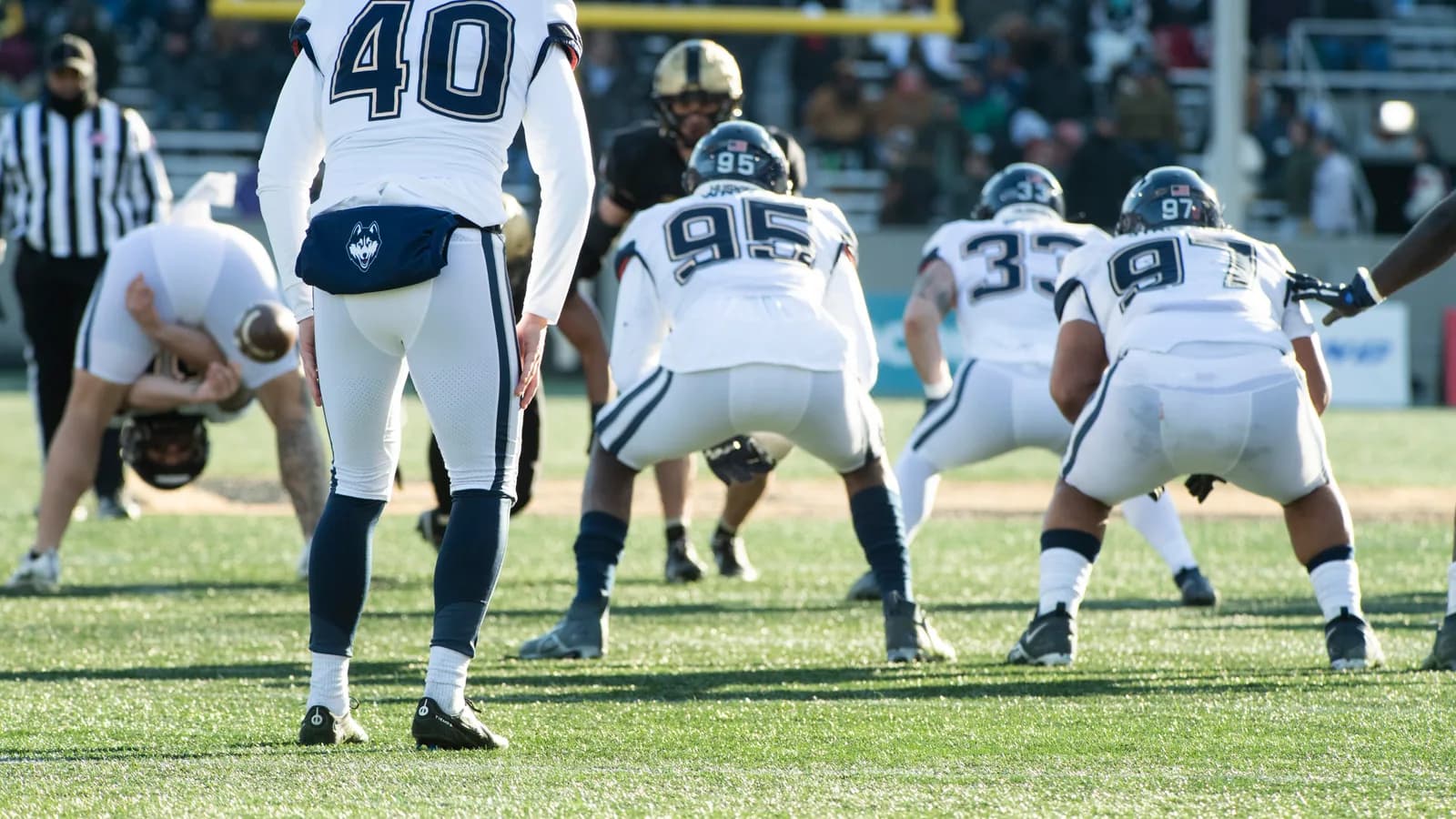 UConn lines up on offense against Army at Michie Stadium in 2022.