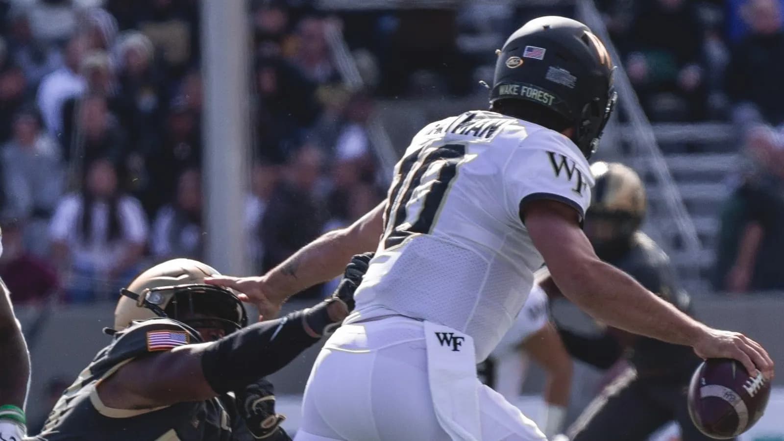 Wake Forest carries the ball against Army.