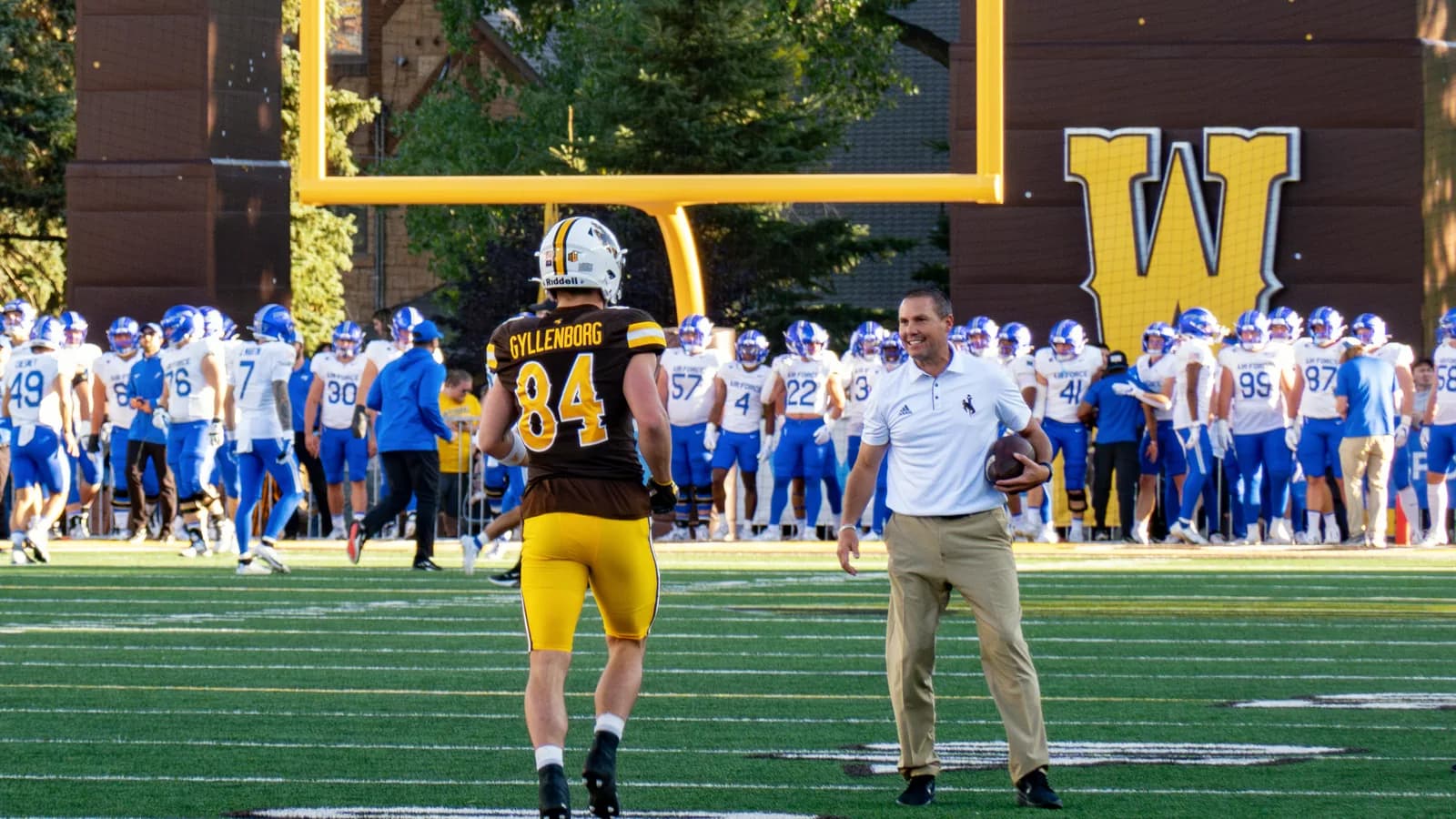 Wyoming tight end John Michael Gyllenborg in a brown-and-gold Cowboys uniform.