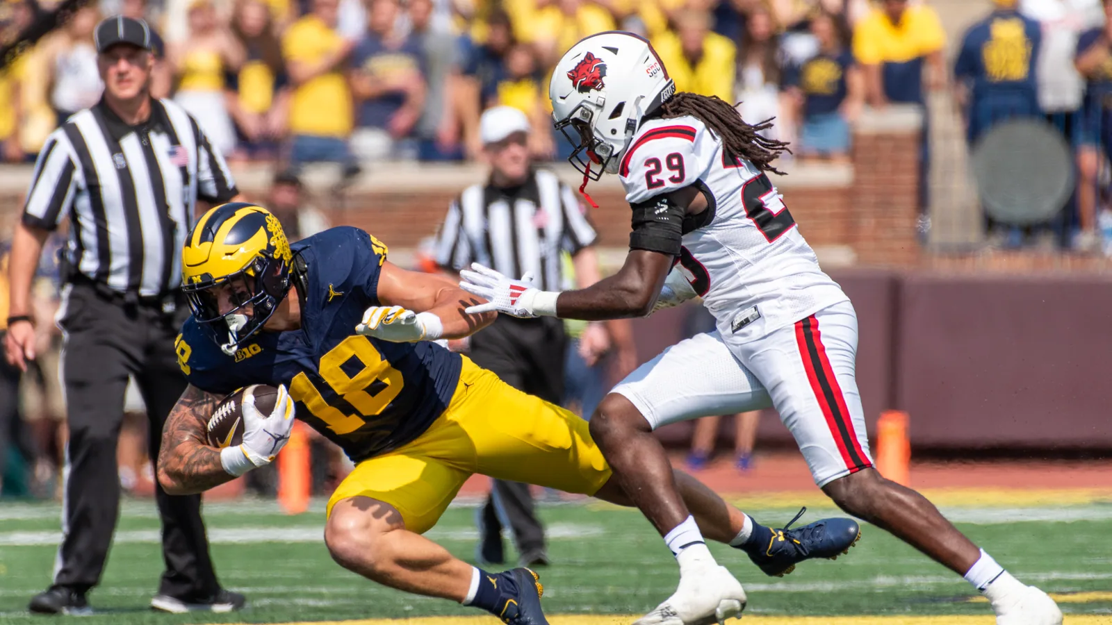 Arkansas State carries the ball against Michigan in 2024.