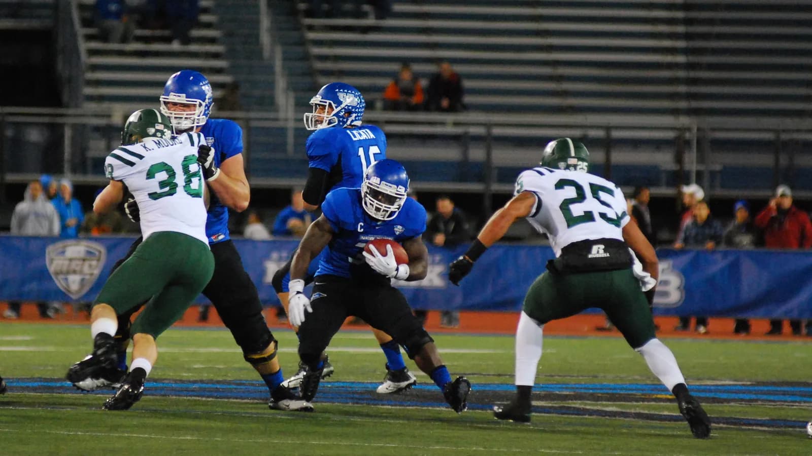 Buffalo running back Branden Oliver carries the ball against Ohio in 2013.