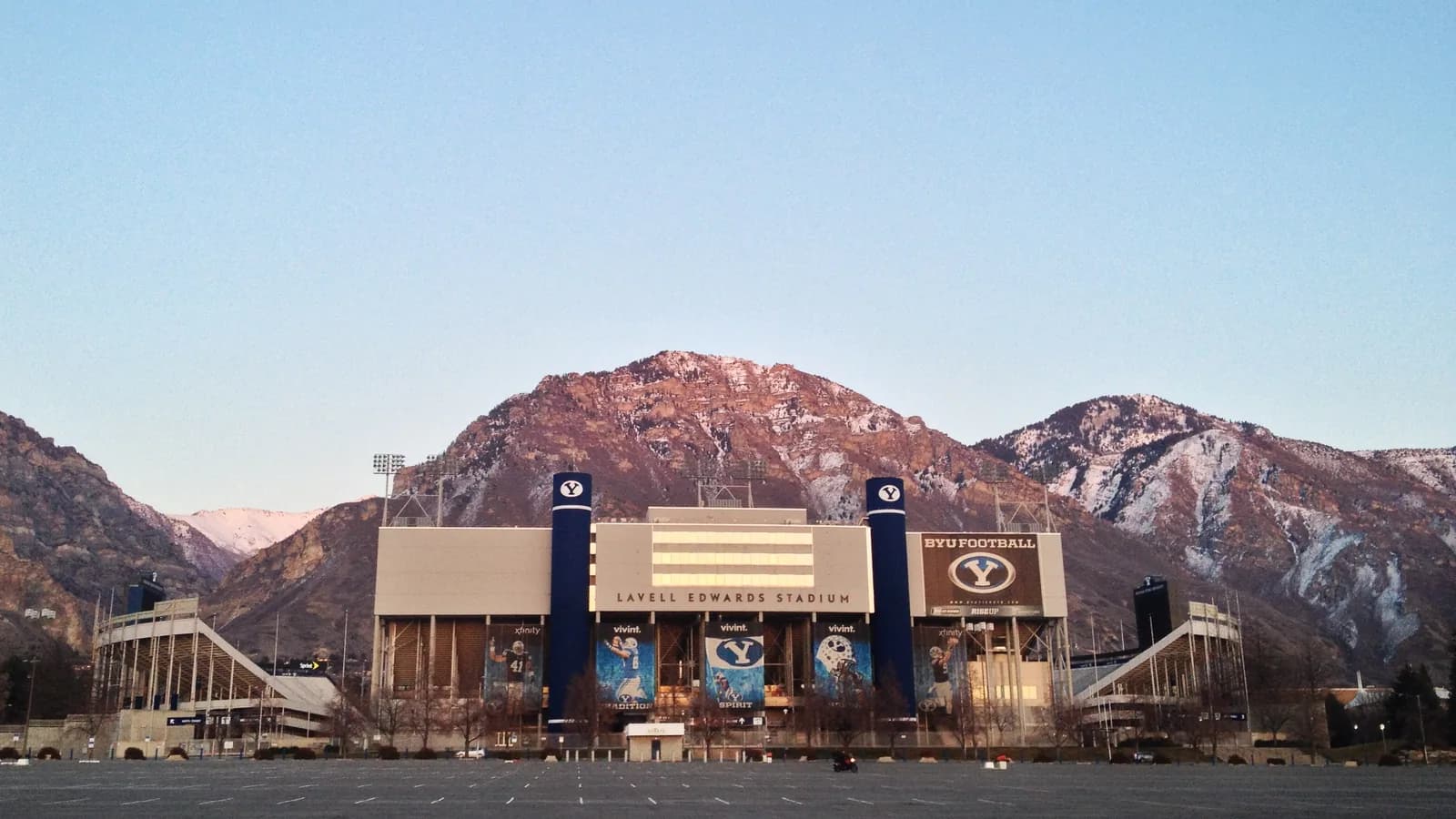 LaVell Edwards Stadium with the Wasatch Mountains behind it.