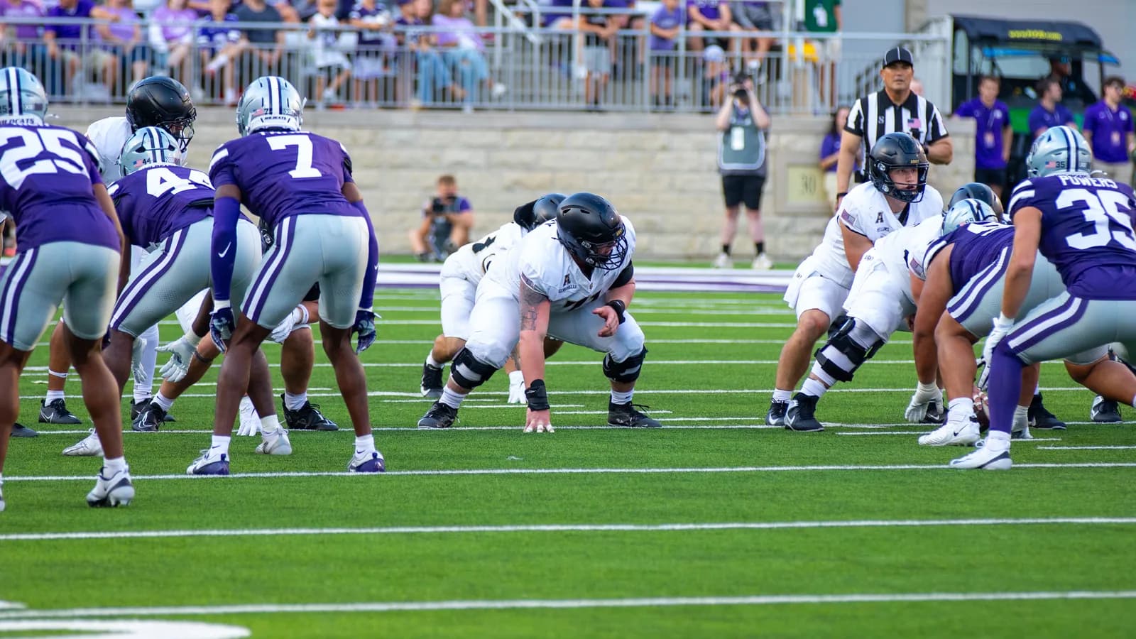 Kansas State's defense lines up against Army in 2025.